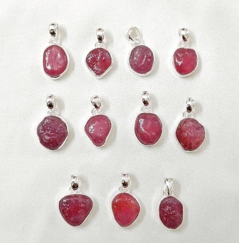 Wholesale lot of 11 natural red ruby 925 sterling silver pendants